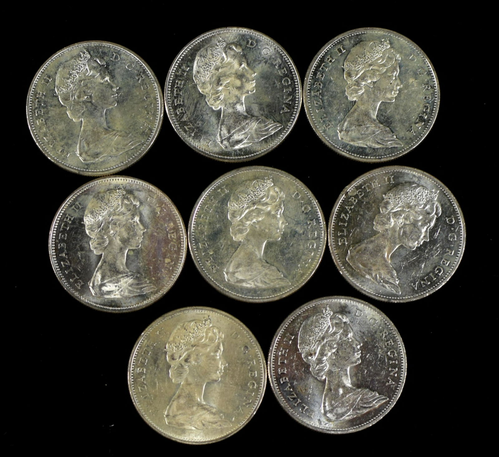 Eight 1965 Canadian Silver Dollars (1 of 2)