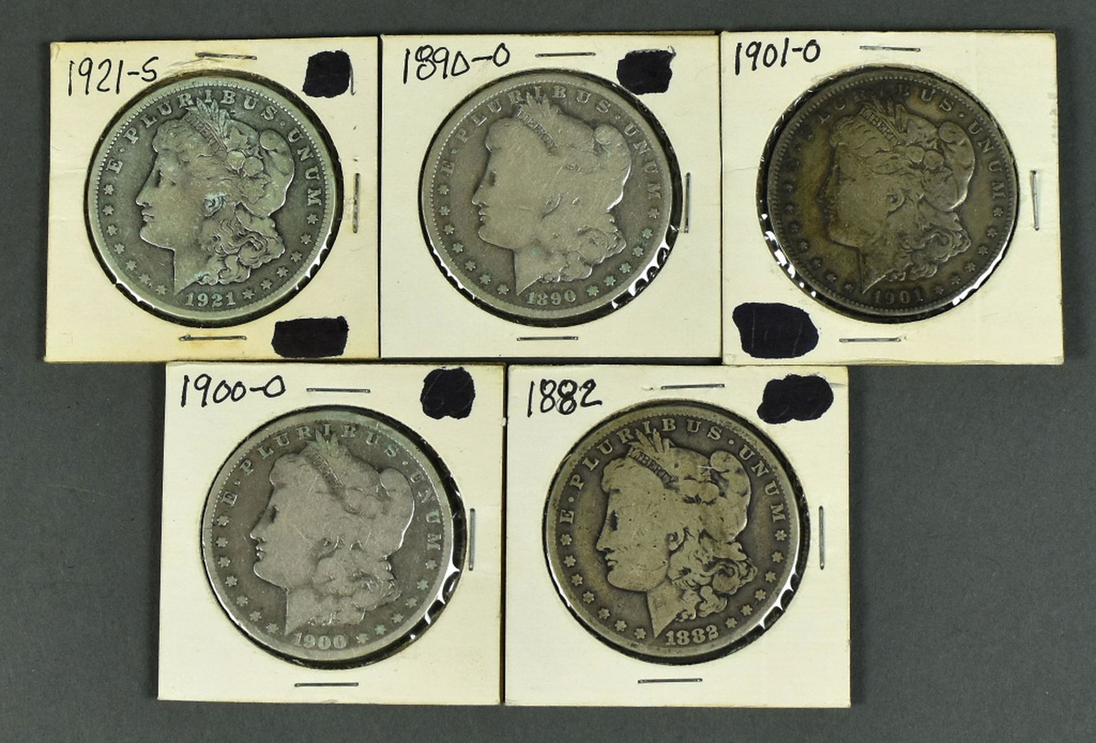 Five Circulated Morgan Dollars (1 of 2)
