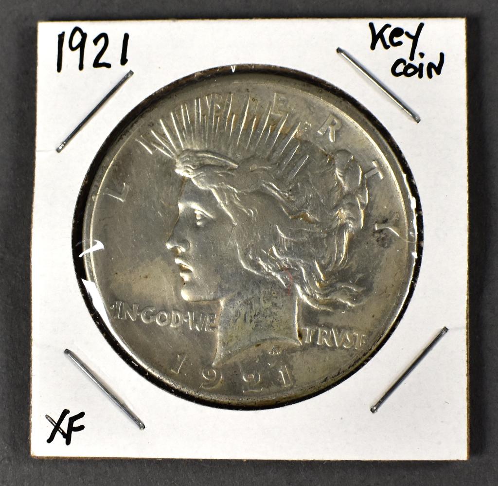 1921 Peace Dollar: Key coin in the series. Grades nice (XF). Very sutible coin for the collector.