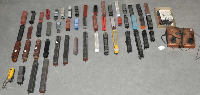 Large Collection of HO Scale Trains: Large Collection of HO Scale Trains Includes eight engines. Most are Pennsylvania. Made by AHM & Tyco. Approximately 20 pieces of rolling stock, five passenger cars, eight buildings, dual transformer.