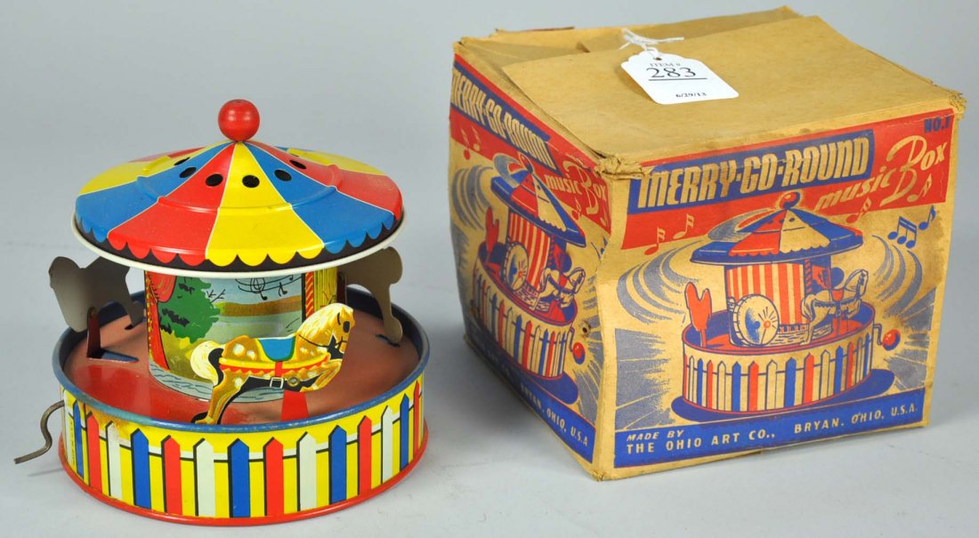 Ohio Art Co. Lithographed Tin Merry-Go-Round: Ohio Art Co. Lithographed Tin Merry-Go-Round Merry-go-round music box in original box. Toy is near mint. Box is approximately 4/10.