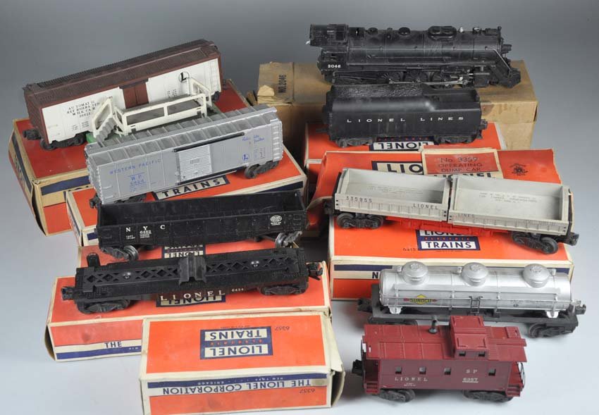 Group of Lionel Trains in Boxes: Group of Lionel Trains in Boxes 2046 engine and tender; 6464 WP box car; 6415 tank car; 6424 flat car, no load; 6462 gondola; 6357 caboose; 3359 dump car; 3662 milk car. Overall very good condition. B
