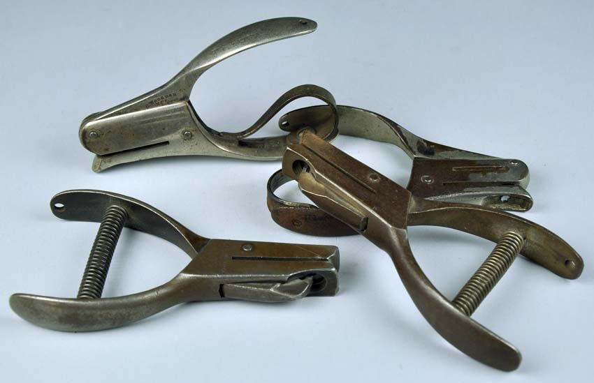 Four Railroad Conductor Ticket Punches: Four Railroad Conductor Ticket Punches All have a different punch design. Loss of nickleplate and moderate rust. 4"" long.