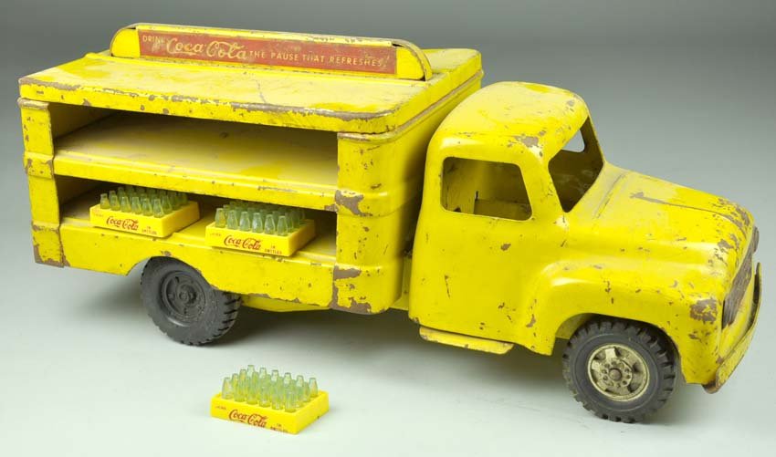 Buddy L Coca Cola Delivery Truck: Buddy L Coca Cola Delivery Truck Rear wheels replaced. Coke decals are weak but readable. Moderate scratches and rust. 6 1/2"" x 14 1/2"" x 6"".