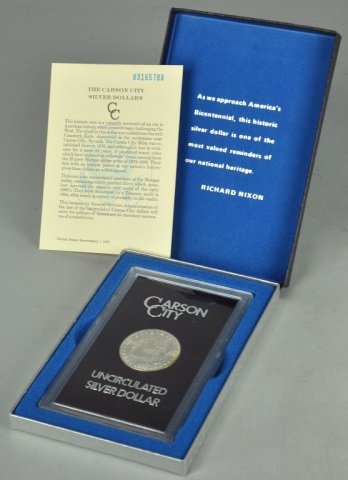 1883-CC Morgan Dollar: Housed in GSA case with papers. Grade range is MS 61-63.