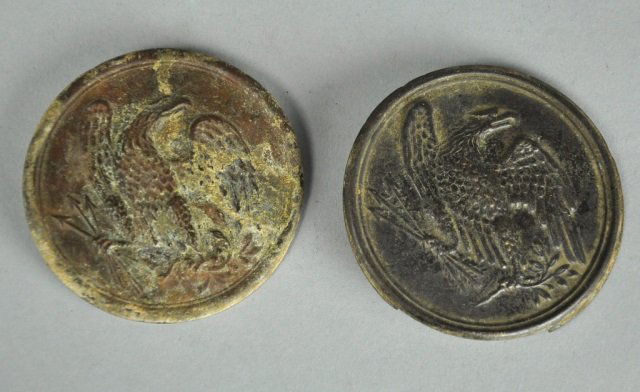 Two Dug Eagle Breast Plates: With hooks missing.