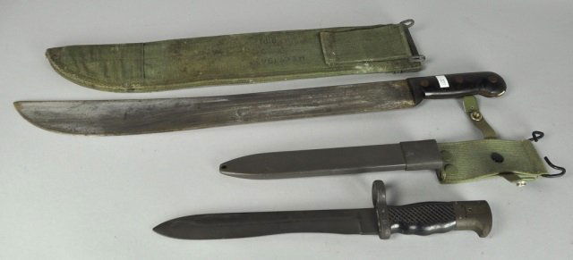 Modern Spanish Bayonet and Machete: With 1945 dated scabbard. Minor rust.