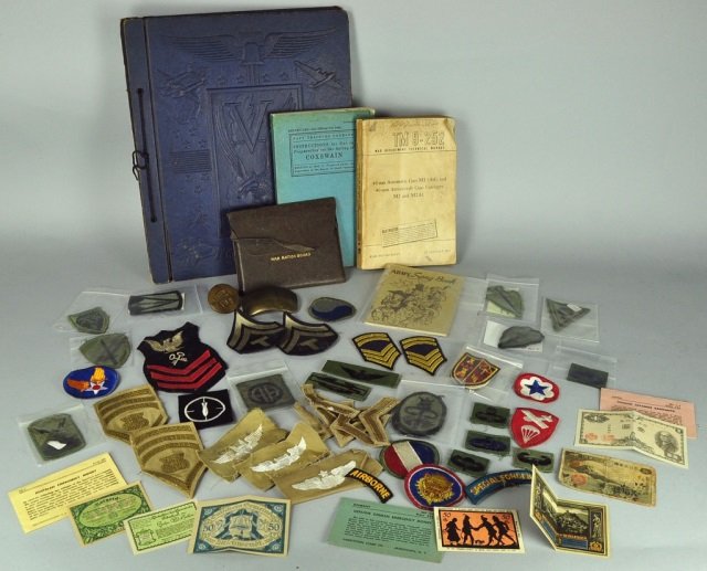 WWII Scrapbook: Over 20 patches mostly post war to modern. Includes WWII song book, manuals, and ration stamp book.