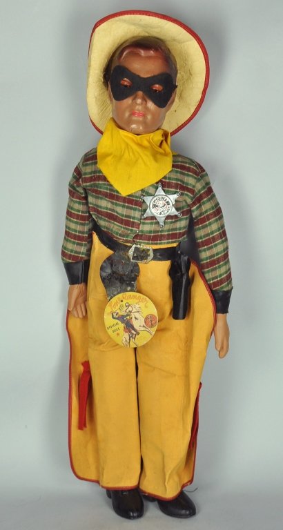 24" Lone Ranger Doll by Dollcraft: Has mask, hat with hat band, badge, paper label, and both holsters. Original pistols not present. Composition head with some cracking. Scuff marks to hair on both sides of head. Overall condition is g