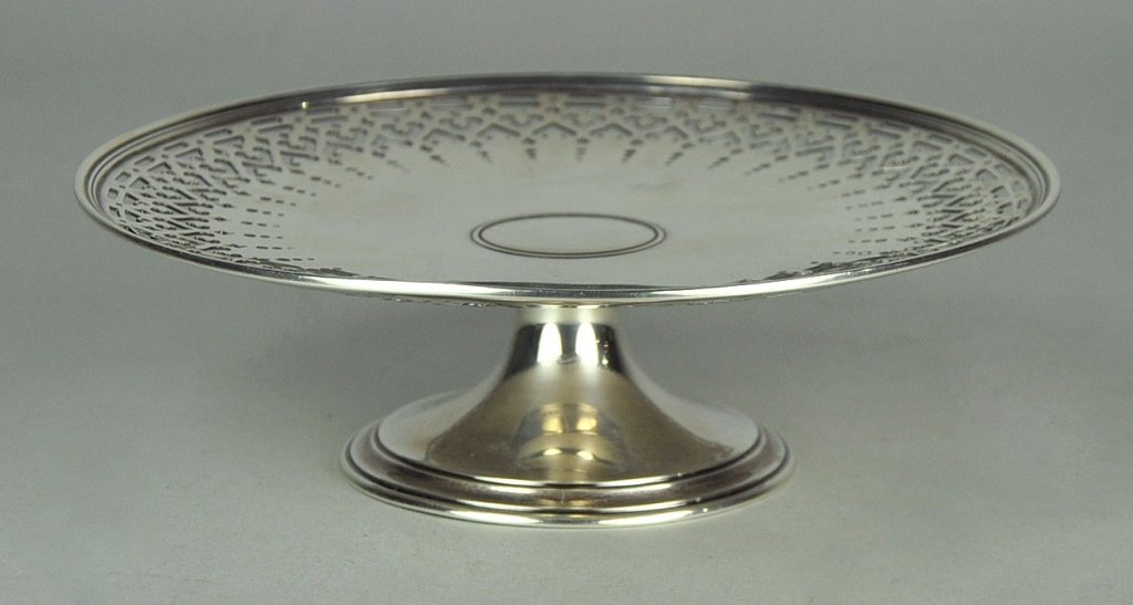 Tiffany & Co Sterling Tazza: Circa 1920. Reticulated design on rim. Marked "Tiffany & Co/15287A Makers/Sterling Silver/925-1000/M." 2 1/4" x 7 1/4" Dia. 8.61 Troy oz.