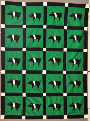 Minnie Adkins Pig Quilt-Top: American - Kentucky, b. 1934. Quilt-top in green. Iconic design by the leader in Kentucky Folk Art, Minnie Adkins. 94" x 70". Adkins has works in the Smithsonian collection as well as the Kentucky Fol