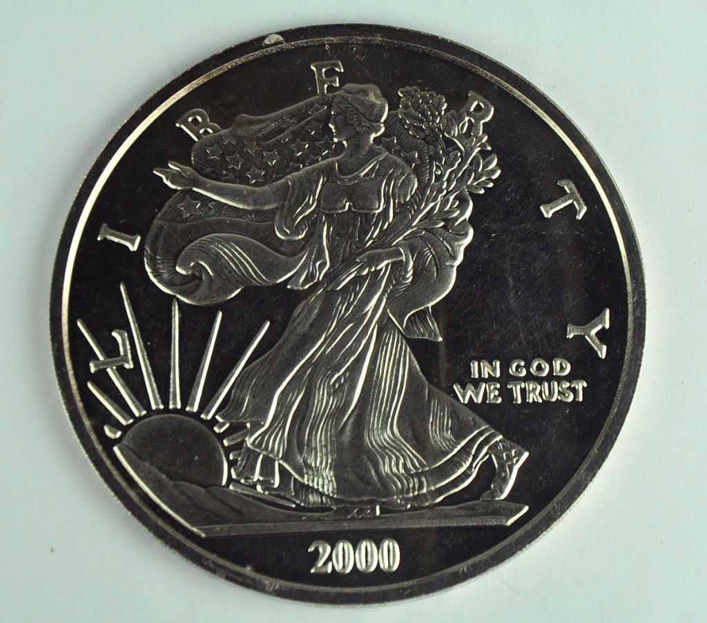 Fine Silver Round with Silver Eagle Obverse: One half Troy pound. Dated 2000 with #23405 on edge. Nice investment lot.