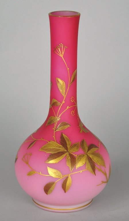 Stick Vase by Thomas Webb & Sons: Produced circa 1880. Decorated with applied gilt florals, stems, and leaves. Marked, "519/5 P.3" on the underside. 9 1/2" H. x 4 1/2" W.