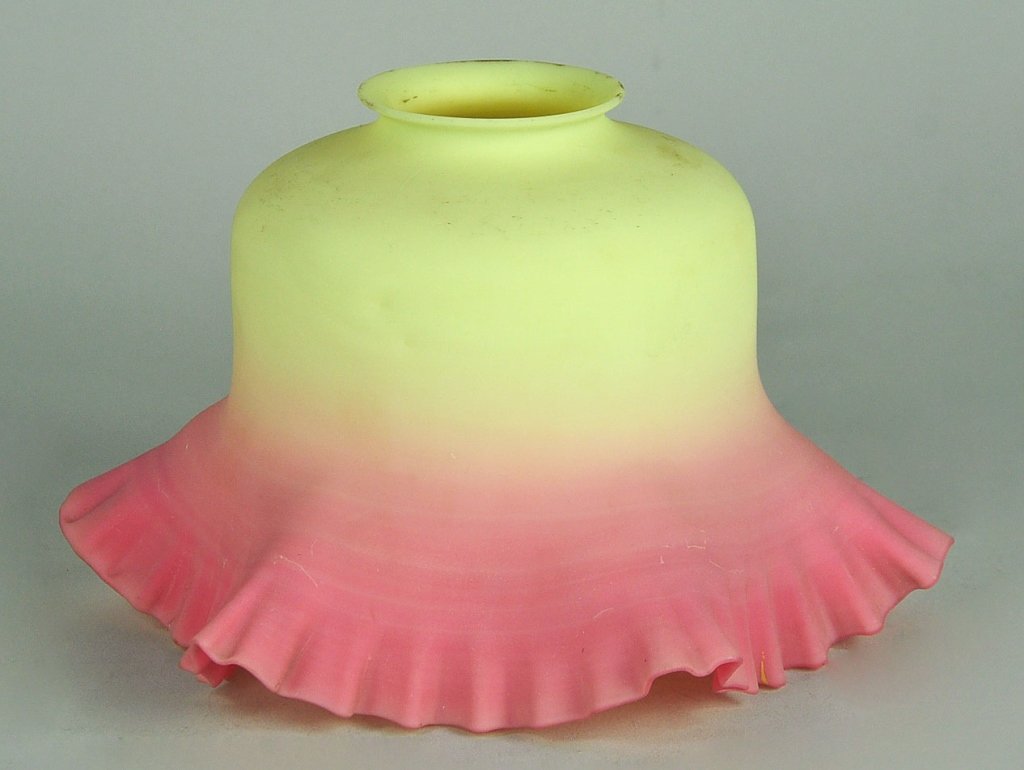 Burmese Lamp Shade by Thomas Webb & Sons: Produced in Stourbridge, England, 1885-1925. With ruffled rim. 6" H. x 9" W.