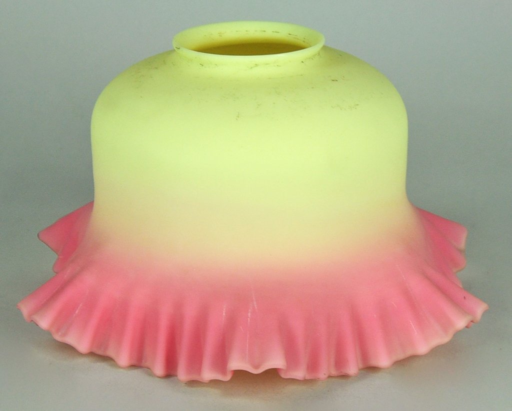 Burmese Lamp Shade by Thomas Webb & Sons: Produced in Stourbridge, England, 1885-1925. With ruffled rim. 6" H. x 9" W.