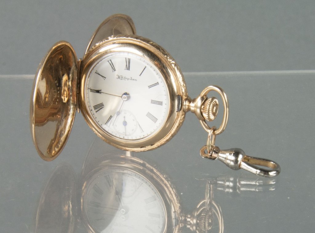 14K Gold Hampden Ladies Pendant Watch: Hunter case. Works marked "Molly Stark". SN 1244284. 1899. Size 3/0. 7 jewels. Running but not guaranteed.