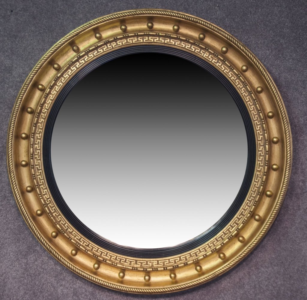 Federal Style Convex "Bulls-Eye" Mirror: Late 20th century. Cavetto and rope molding with cannon ball ornamentation. 42" Dia.