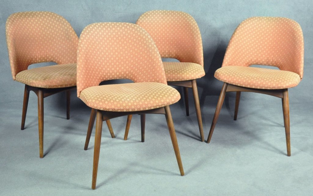 Four Adrian Pearsall Dining Chairs: American, 1925-2011. Mid 20th century, for Craft Associates. Walnut. Unmarked. One with repaired leg. Four total with replaced upholstery. 30 1/2" x 20 3/4" x 23 1/4".