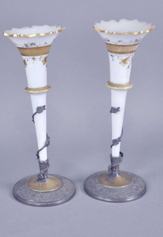 Pair Middletown Plate Co. Glass Epergnes: Middleton Plate Co., 1864-1899. In quadruple plated holders. Cylindrical shaped vases in soft grey Bristol glass decorated with gilt florals and gold metal band around their perimeters. Scalloped rim