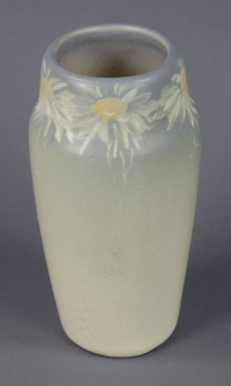 Weller Hudson Vase with Daisies: Having light blue upper portion, with hand-painted daisies, fading to cream. Base stamped "Weller." With visible crazing (darker at base) and one minimal spot of black (appears to be beneath glaze). 7