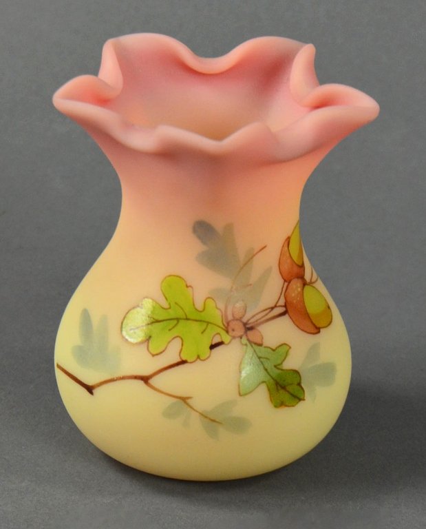 Queen's Burmese Post Vase by Thomas Webb & Sons: Marked on its underside "Thos. Webb & Sons/Queen's Burmese/Patented." Jules Barbe decoration in raised acorn motif. 3 1/4" H.