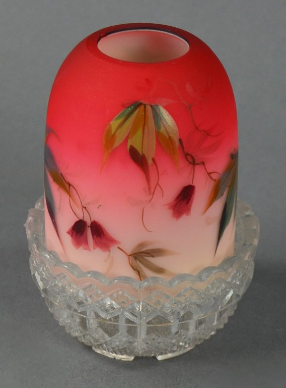 Queen's Burmese Fairy Lamp by Thomas Webb & Sons: Jules Barbe polychrome floral decoration. Clear base reads "S. Clarke/Fairy Pyramid." Small chip on rim. 4" H.
