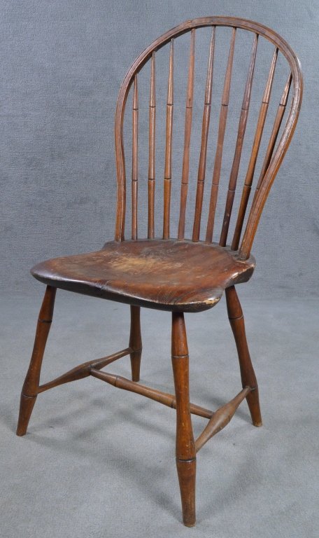 Bow-Back Windsor Side Chair: Shaped seat and bamboo-turned legs and spindles. With repaired break to back hoop. 37" H. x 19" W.