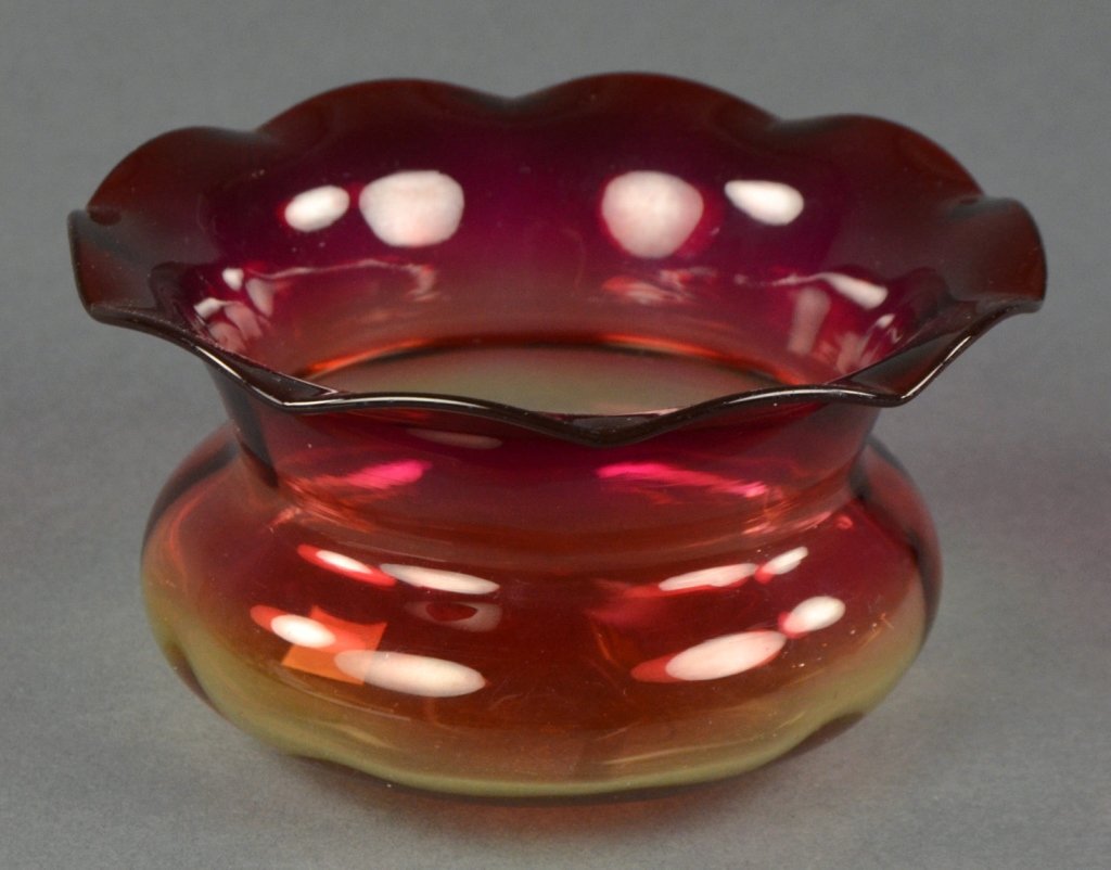 Amberina Ladies Spittoon by New England Glass Co.: Circa 1890's. Ruffled rim. Shaded from amber to cranberry. 2 3/4" H. x 5 1/4" W.