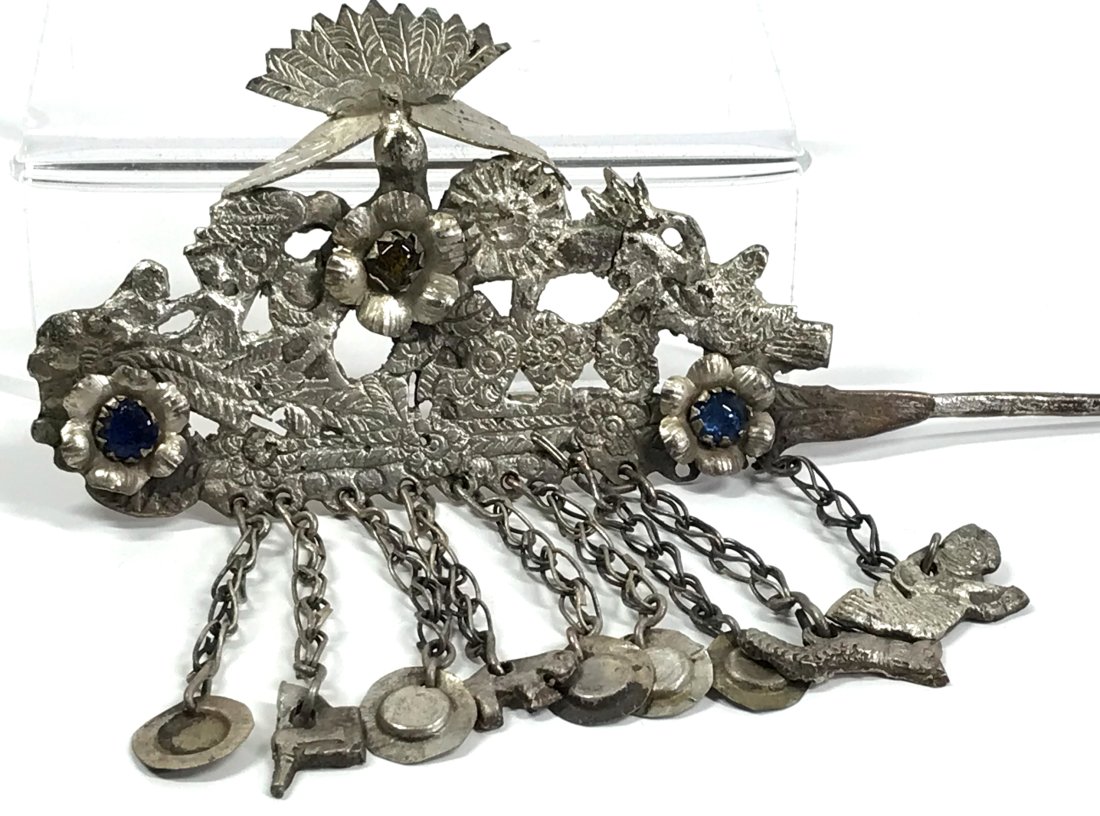 Andean Metal Tupo shawl pin.: Andean Metal Tupo shawl pin.Glass cabs flowers, birds and dangles. It measures 8 inches long, 4 ¾ widest. Main bod