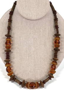 Vintage Czech Art Deco Glass Brass Wooden Necklace: Vintage Czech Art Deco Amber Color Glass, Brass, Wooden Beads Necklace. For measures please refer to the picture taken with a measure tape. Weight: 42 Grams. This is a NO RESERVE AUCTION: there are no