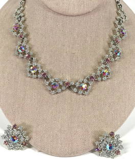 Vintage Coro Crystals Silver Necklace & Earrings Lot: Vintage Coro rose and AB crystals flowers silvertone metal collar necklace and screw back earrings set. Marked on clasp and on the screw back. For measures please refer to the picture taken with a mea