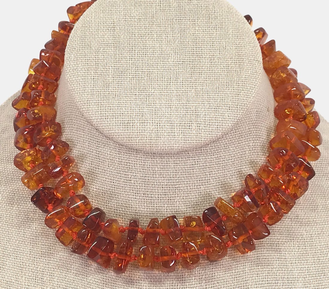 Vintage Polished Amber Nuggets Beads Necklace.: Vintage Polished Amber Nuggets Beads Necklace. Screw on clasp, knotted in between. It measures around 28 inches long end to end. For measures please refer to the picture taken with a measure tape. Wei