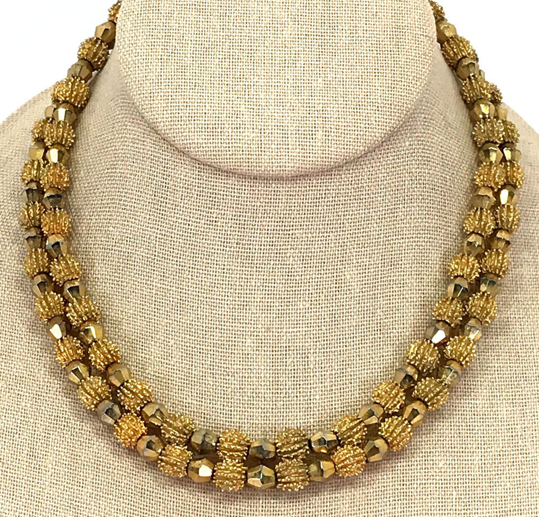 Vintage Crown Trifari crystals & goldtone metal collar necklace: Vintage Crown Trifari gilt black faceted crystals & dotted rounded goldtone metal beads two strands collar necklace. Crown T metal label , Marked Trifari on clasp. For measures please refer to the pic