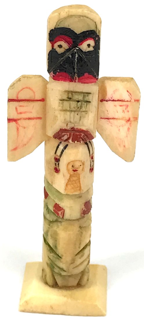 Vintage Northwest Coast Miniature Totem Pole.: Vintage Northwest Coast Miniature Totem Pole. Polichrome carved bone. For measures please refer to the picture taken with a measuring tape. For measures please refer to the picture taken with a measur