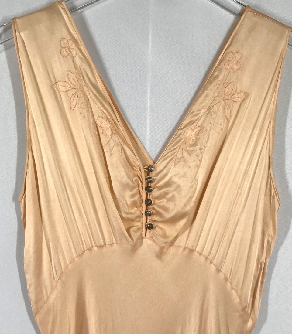 Vintage Mid Century Silk Lingerie Slip Maxi Dress. Carson Pirie Scott: Vintage Mid Century Embroidery Silk Lingerie Slip Maxi Dress. Carson Pirie Scott Chicago Label. No size label. Metal buttons. Length: 53 inches. For measures please refer to the picture taken with a m