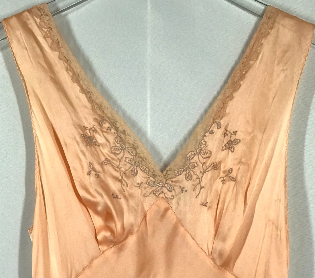 Vintage Mid Century Silky Lingerie Slip Maxi Dress. Loreley Label: Vintage Mid Century Embroidery Lace Silky Lingerie Slip Maxi Dress. Sliper Loreley Quality Crepe size 36 label. Length: 59 inches. For measures please refer to the picture taken with a measuring tape.