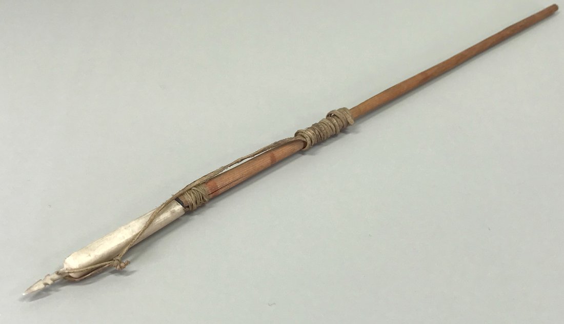 Antique Inuit Model of a Harpoon.: Antique Inuit Model of a Harpoon. Wood, Bone, Sinew, Animal Hide. For measures please refer to the picture taken with a measuring tape. This is a NO RESERVE AUCTION: there are no hidden or confidentia