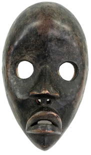 African Dan, Liberia, Mask Carved Wood.: African Dan, Liberia, Mask. Carved Wood. It measures 9 1/4 inches long and 6 inches widest. Weight: 9 oz. This is a NO RESERVE AUCTION: there are no hidden or confidential reserves, all acceptable bid