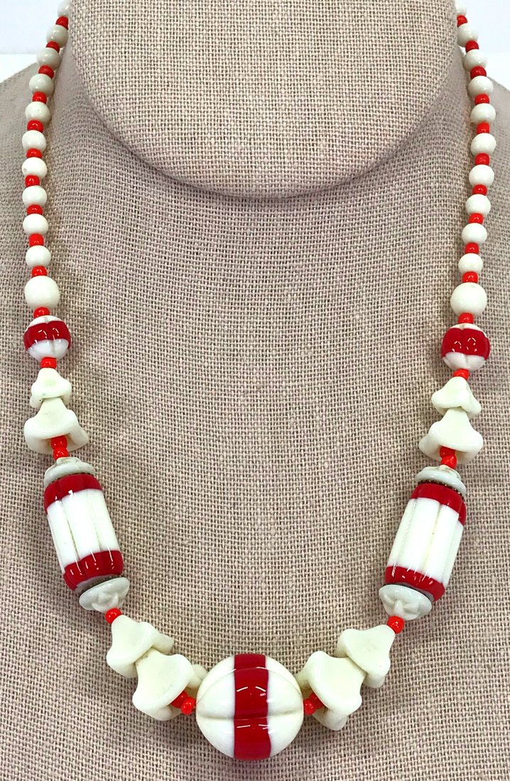 Antique Haskell style red & white glass beaded collar necklace.: Antique Haskell style red & white glass beaded collar necklace. Unmarked. For measures please refer to the picture taken with a measuring tape. Weight: 38 Grams. This is a NO RESERVE AUCTION: there ar