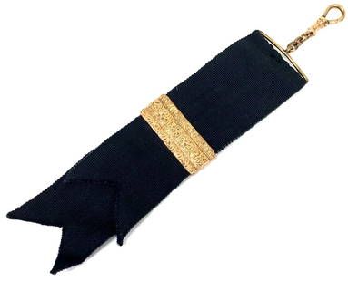 Antique Edwardian The DFB Co mourning ribbon gold filled pocket watch chain.: Antique Edwardian mourning black grosgrain ribbon gold filled pocket watch chain. The hook is marked The DFB Co. For measures please refer to the picture taken with a measuring tape. Weight: 11 Grams.