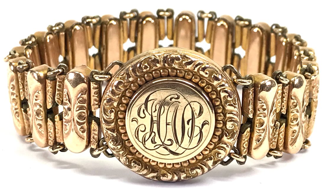 Antique 1905 gold filled expansion accordion sweetheart locket bracelet.: Antique 1905 gold filled expansion accordion sweetheart locket bracelet. Monogram locket top. Marked Pat Dec 13 04 and Design Pat Jul 25 1905. For measures please refer to the pictures that were taken