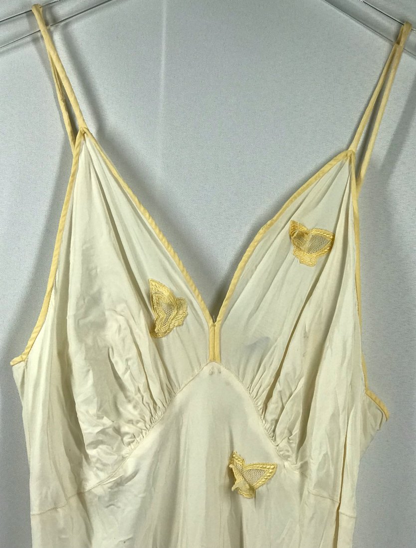 Vintage Mid Century 3D embroidery butterflies Silky Lingerie Slip Maxi Dress.: Vintage Mid Century 3D embroidery butterflies Silky Lingerie Slip Maxi Dress. Length: 56 inches. Artemis 38 Rayon label. No size label. For measures please refer to the pictures that were taken with a