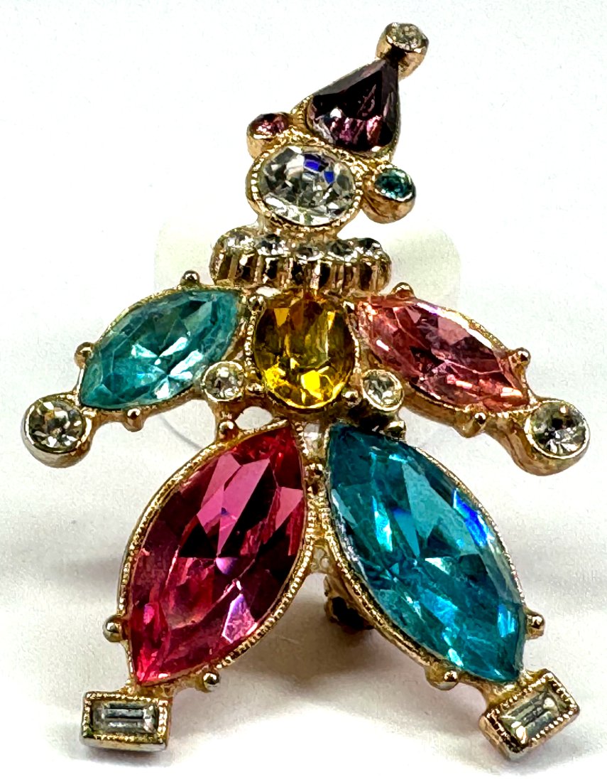 Vintage Ora color crystals & clear rhinestones goldtone metal clown pin brooch.: Vintage Ora color crystals & clear rhinestones goldtone metal clown pin brooch. Marked. For measures please refer to the pictures that were taken with a measuring tape. Weight: 8 Grams. This is a NO R