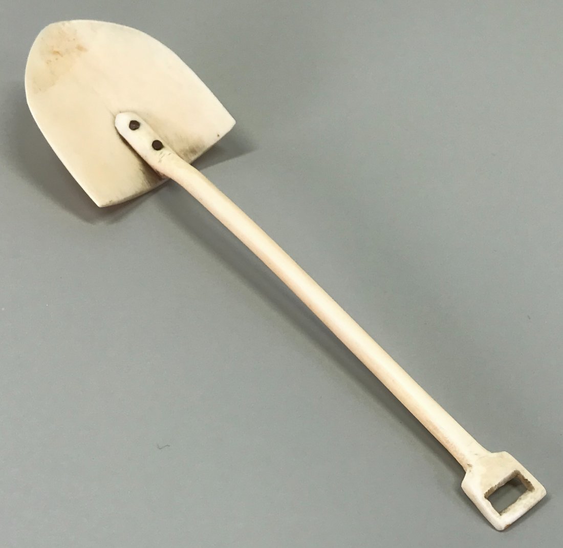 Antique Inuit Model of a Miner"s Shovel.: Antique Inuit Model of a Miner”s Shovel. Bone, Copper. For measures please refer to the picture taken with a measuring tape. This is a NO RESERVE AUCTION: there are no hidden or confidential res