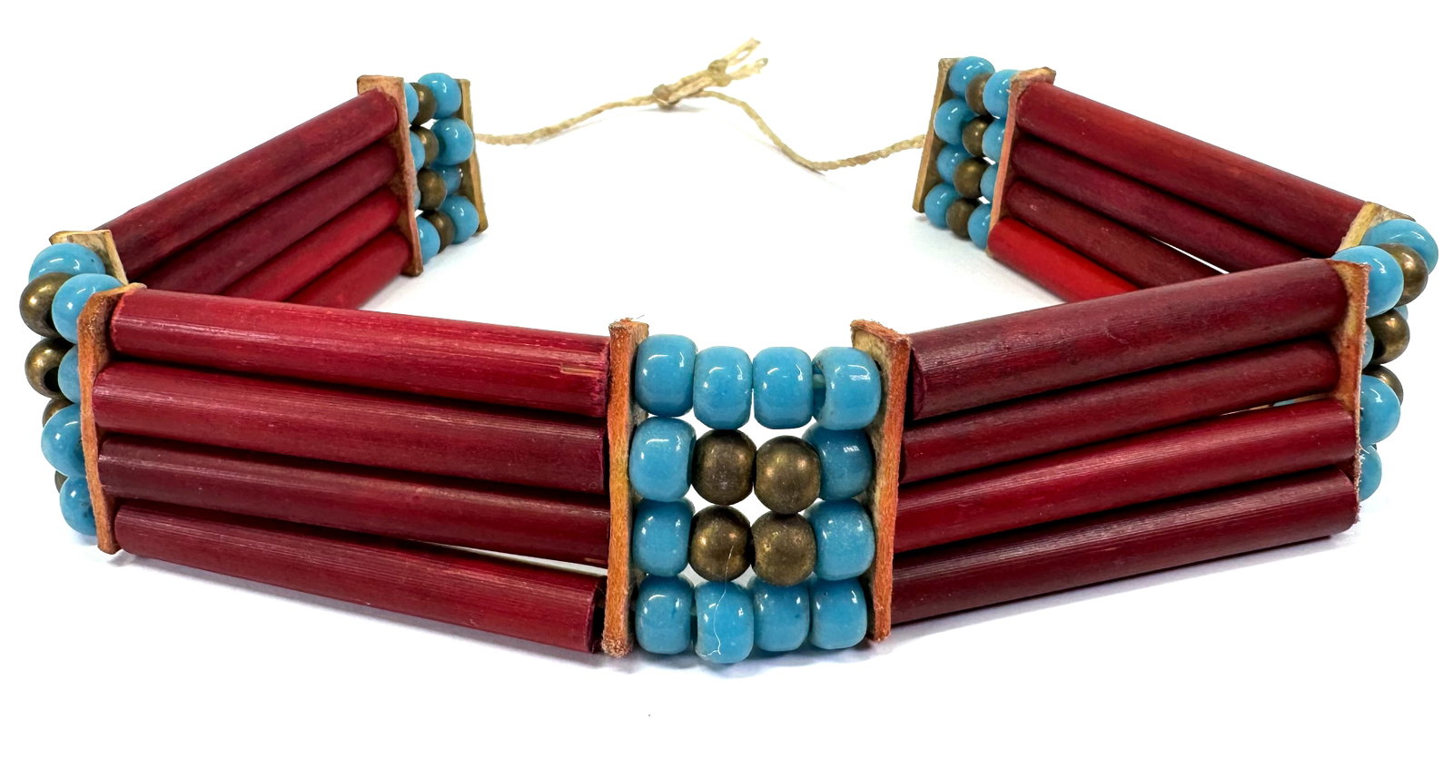 Vintage native american style bone pipeline, glass, brass & braided strap choker: Vintage native american style bone pipeline, glass, brass & braided strap choker. Unmarked . Hand written on the side (please refer to the last picture). For measures please refer to the pictures take