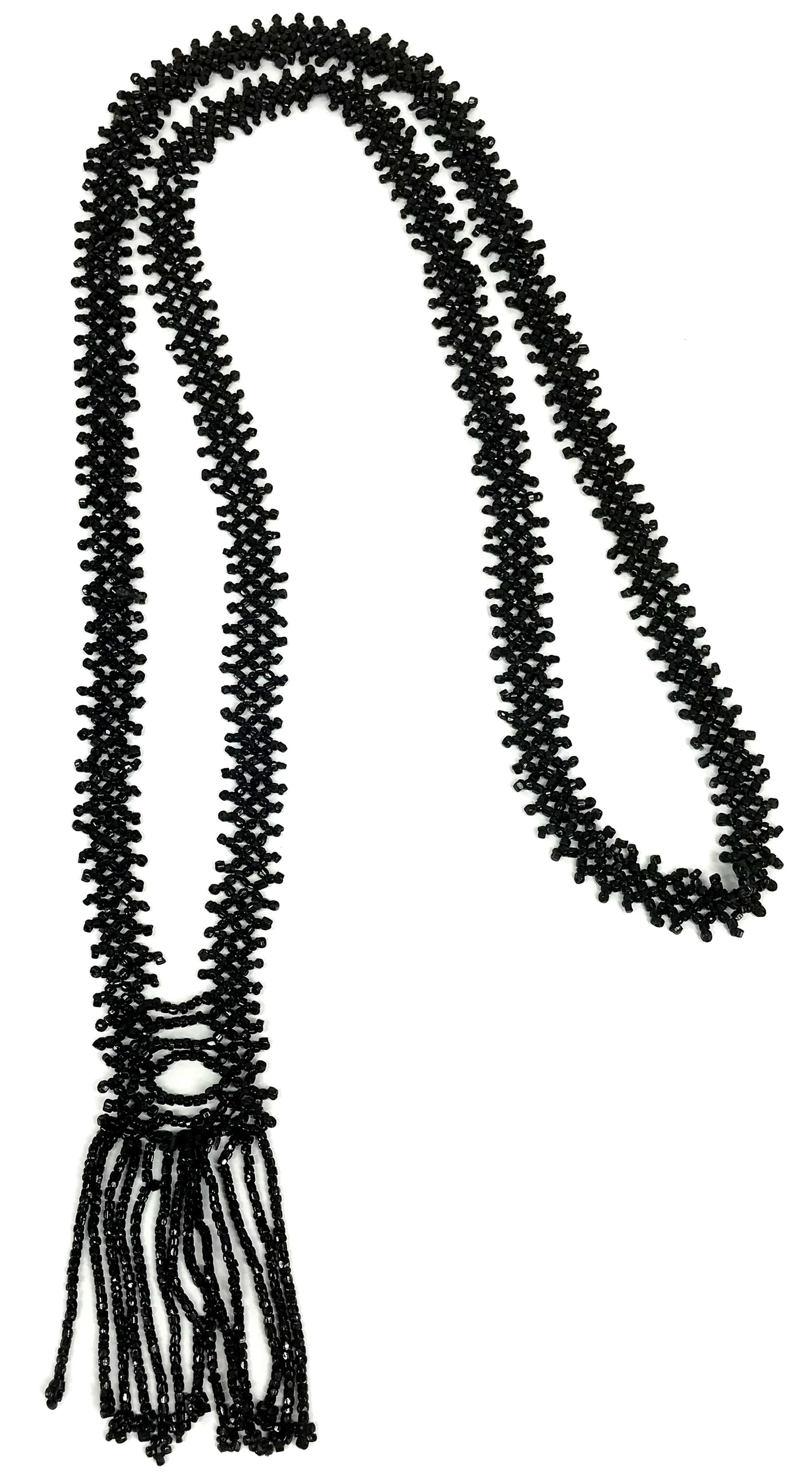 Vintage art deco flapper mourning black seed glass beaded necklace: Vintage art deco flapper mourning black seed glass beaded necklace with fringe. Unmarked. For measures please refer to the picture taken with a measuring tape. Weight: 30 Grams. This is a NO RESERVE A