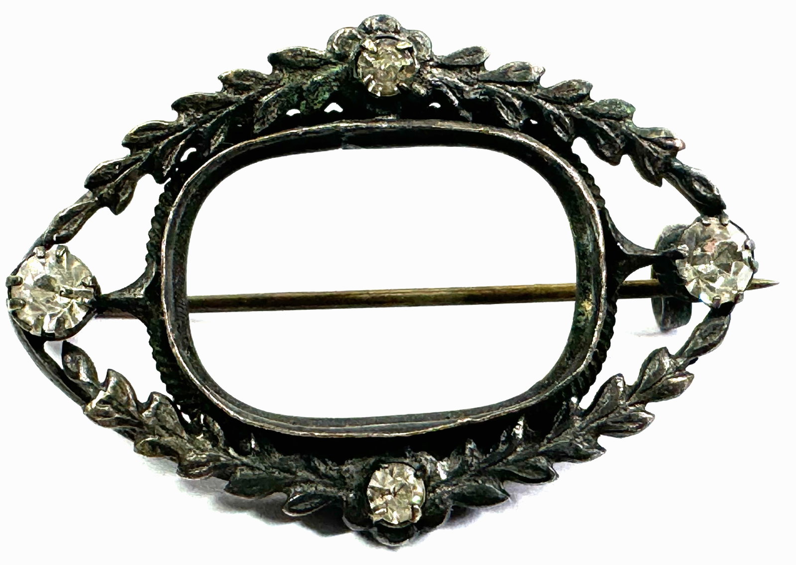 Antique Edwardian clear crystals silvertone cab or jewel setting pin brooch for jewelry make: Antique Edwardian clear crystals silvertone metal cab or jewel setting pin brooch for jewelry make. Unmarked. For measures please refer to the pictures taken with a measuring tape. Weight: 4 Grams. Th
