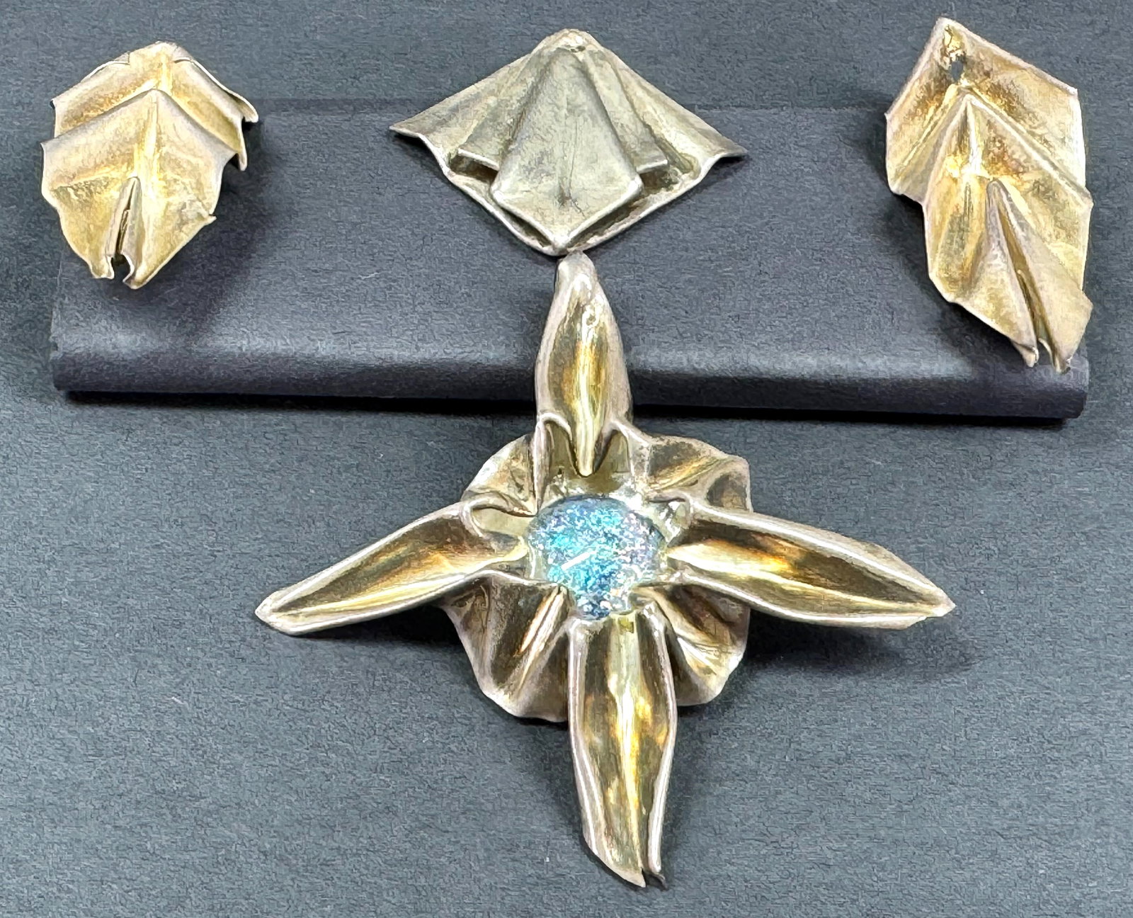 Vintage brutalist artisan crafted opal glass cab flower & 3 folded silvertone metal pendants. (1 of 9)