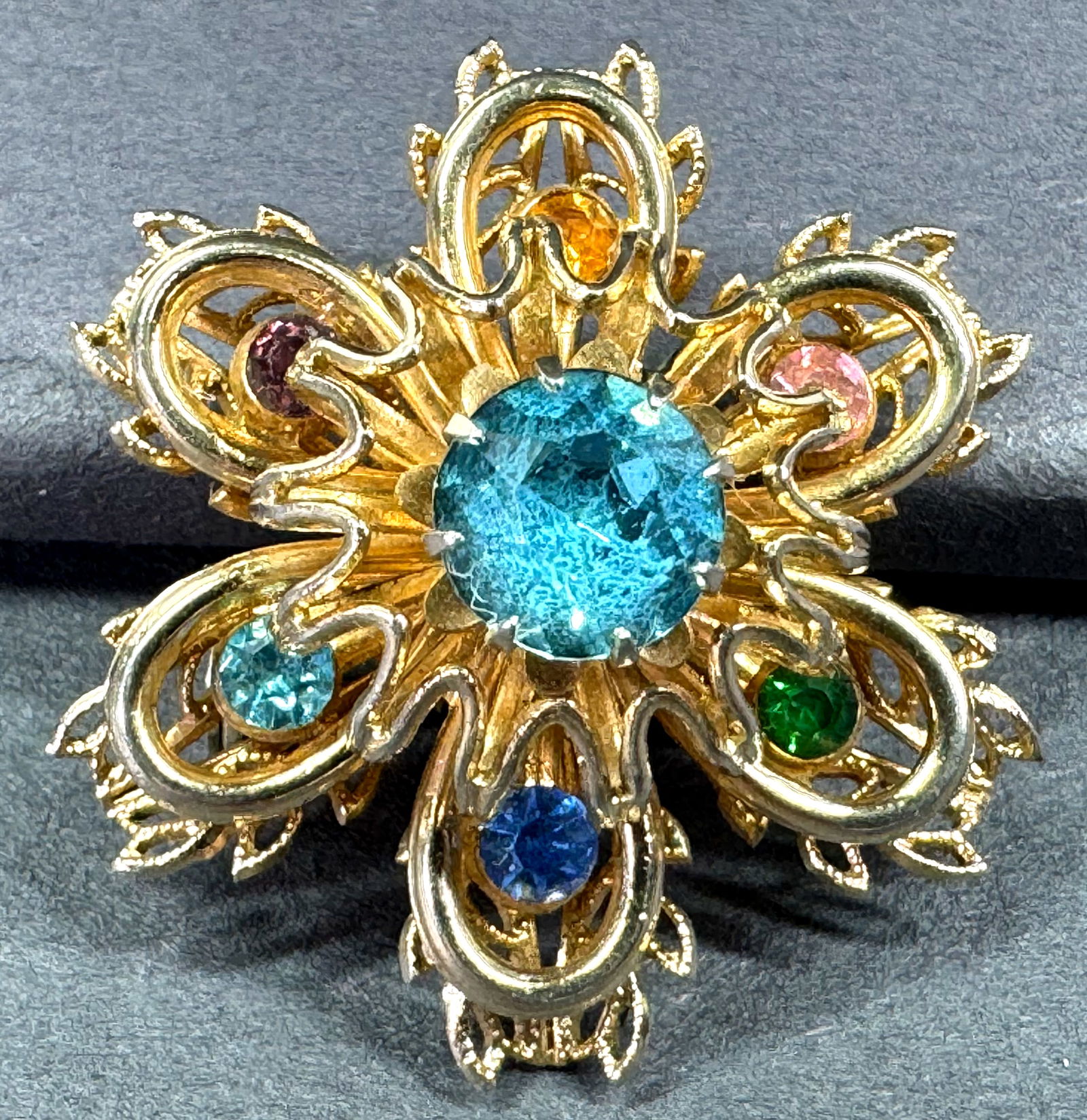 Vintage Coro color crystals filigree goldtone metal flower pin brooch.: Vintage Coro color crystals filigree goldtone metal flower pin brooch. Marked. For measures please refer to the pictures taken with a measuring tape. Weight: 7 Grams . This is a NO RESERVE AUCTION: th