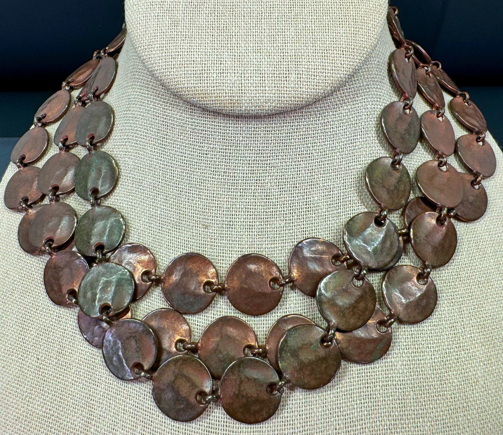 Vintage boho modernist hammered coppered metal rounded beads 3 strands collar necklace.: Vintage boho modernist hammered coppered metal rounded beads 3 strands collar necklace. Unmarked. For measures please refer to the pictures taken with a measuring tape. Weight: 122 Grams. This is a NO